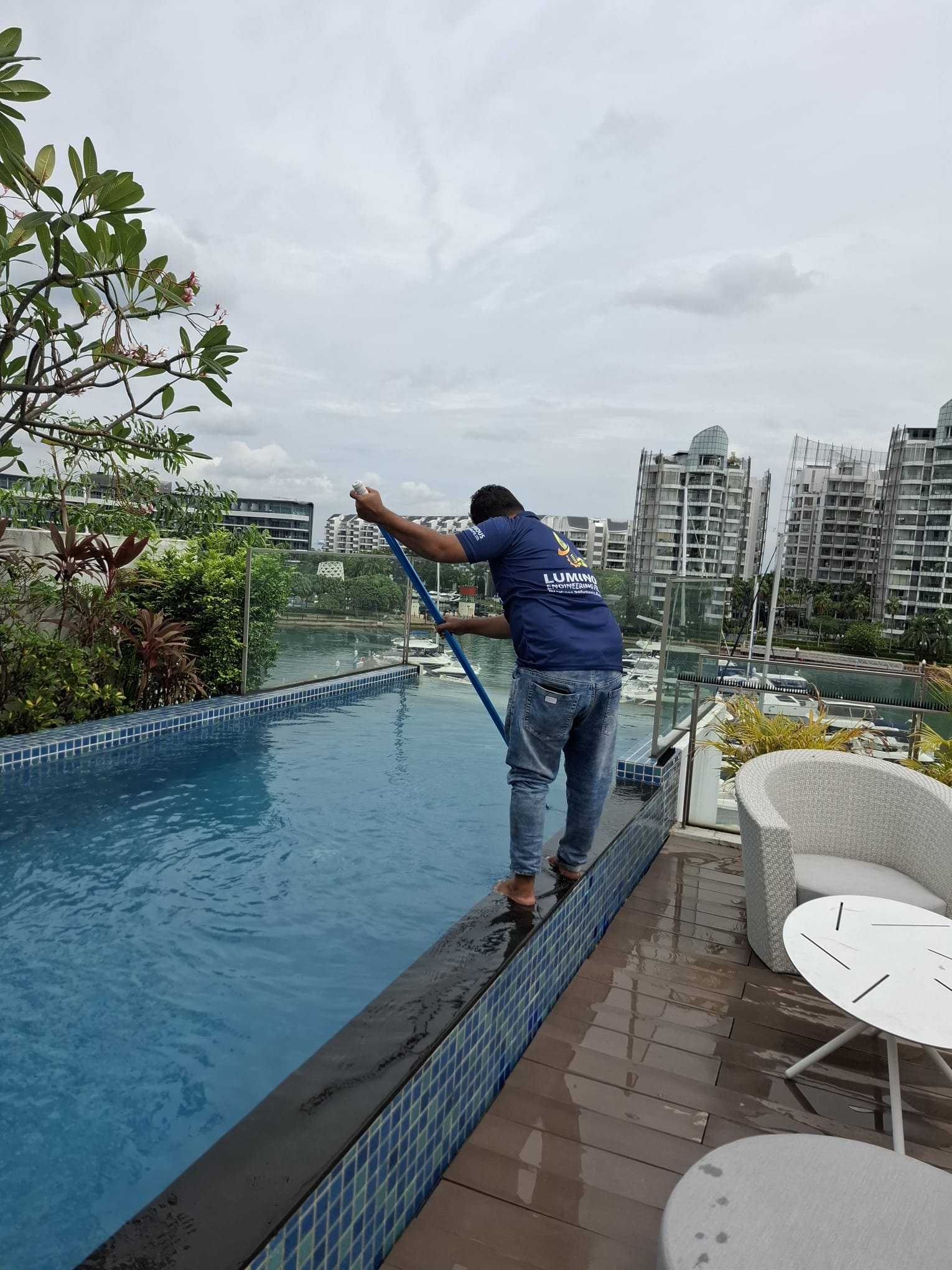 routine pool cleaning by Luminous engineering in singapore
